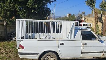 QAZ: QAZ 3110: 2.4 l | 1998 il Sedan — 3