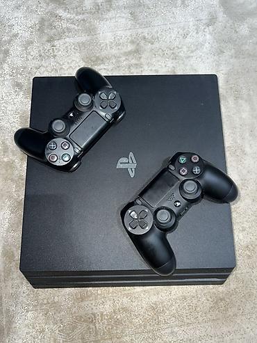 switch oled: PlayStation 4 Pro (PS4 Pro) с двумя беспроводными контроллерами — 1