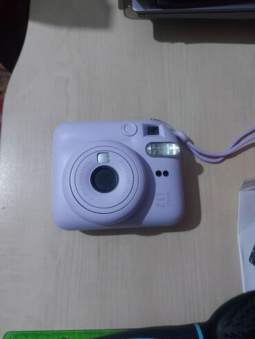Fotokameralar: İnstax mini 12 Tam işlək vəziyyətdədir. Cəmi 10 şəkil çəkilib. 1 aydı