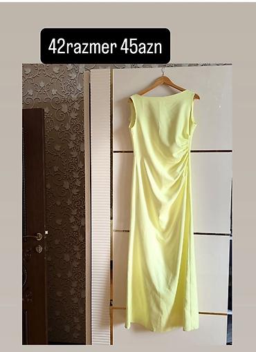 Qadın paltarları – bir neçə model 1) Açıq sarı rəngdə, qolsuz, uzun