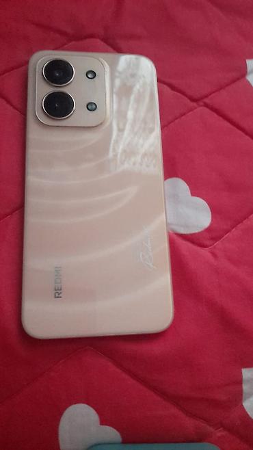 колонки 2 1: Смартфон Redmi 15с в бежевом/перламутровом цвете. Ключевые — 2