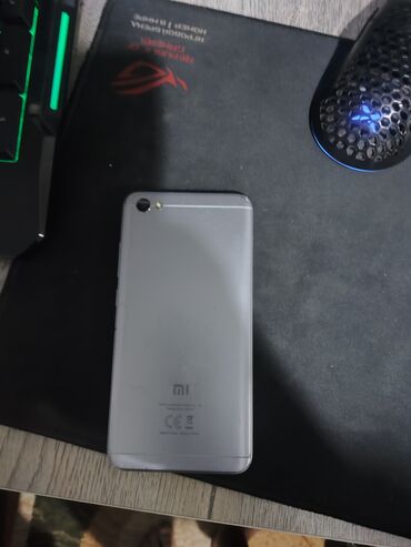 сколько стоит раскладной телефон: Xiaomi, Redmi 5A, Б/у, 4 ГБ, цвет - Белый, 1 SIM