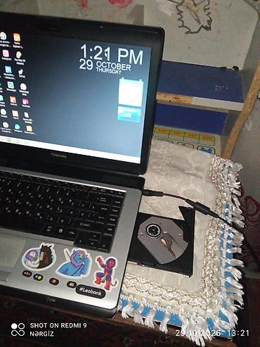 netbook toshiba: Toshiba Satellite noutbuk barterde var telfonan — 2