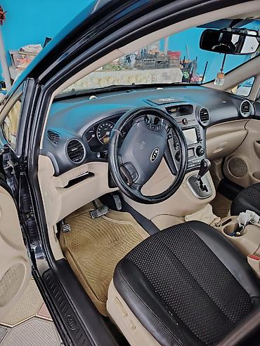 mercedes disk per page 40: Kia Carens: 0.2 l | 2008 il Sedan — 5