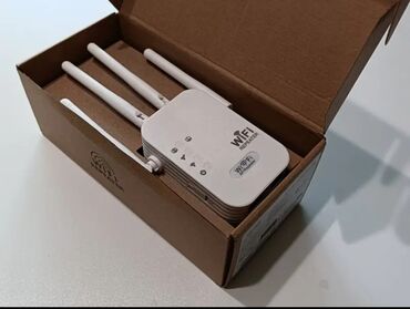 Modemlər və şəbəkə avadanlıqları: Wifi erazi guclendirici wifi zeif catdigi yerlere rahatligla internet