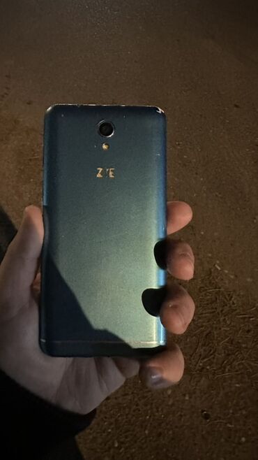 телефон fly ds169: ZTE v889m, 512 GB, rəng - Göy, Sensor
