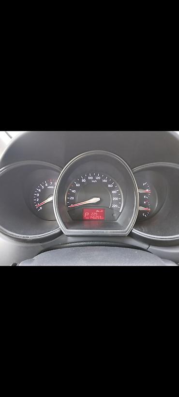 bora: Kia Rio: 1.4 l | 2013 il Sedan — 2