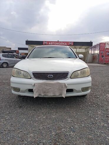 прикуриватель авто аккумулятора бишкек: Белый седан Nissan Cefiro с хромированной решеткой радиатора и