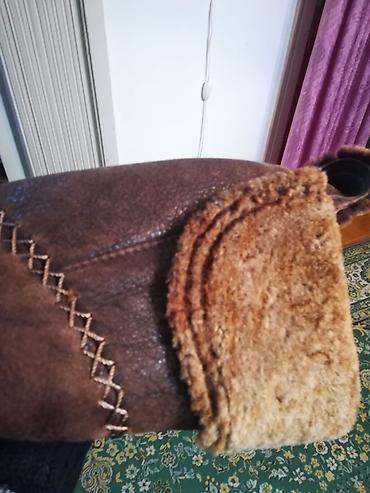 areve kaputi zenski: Ženska bunda/kaput od jagnjeće kože (shearling), tamno braon boje. - — 2