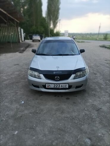 домик авто: Mazda 323: 2003 г., 1.3 л, Механика, Бензин, Хэтчбэк