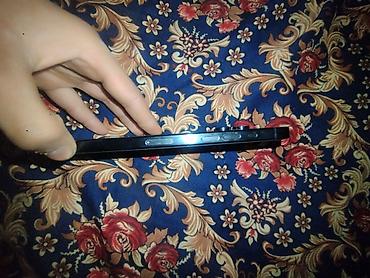 sony i pro: Смартфон в тёмно-синем цвете с лаконичным современным дизайном. Корпус — 2