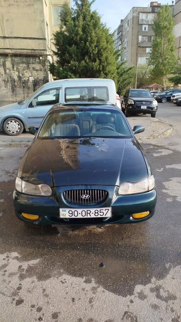 Soyutma və qızdırma sistemləri: Hyundai sonata.her seyi islekdi kondisioner xaric.ehtiyyat hissesi