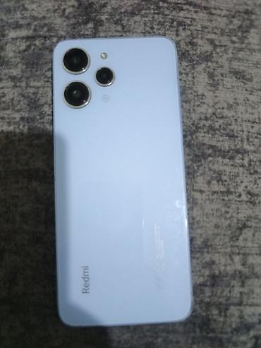 редми ноот 12: Смартфон Redmi 12 (модель 23053RN02A), цвет светло‑голубой. Ключевые — 1