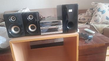 duymə tikən maşın: Mini musiqi mərkəzi – 2.1 akustik sistem Komplekt: - Mərkəzi blok — 2