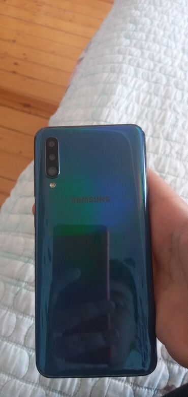 işlənmiş telefonlar kreditlə: Samsung A50s, 64 ГБ, цвет - Голубой, Отпечаток пальца