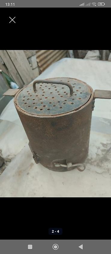 qara sam yandirmaq: Metaldan hazırlanmış ocaq/soba tipli qab təqdim olunur. Silindrik — 1