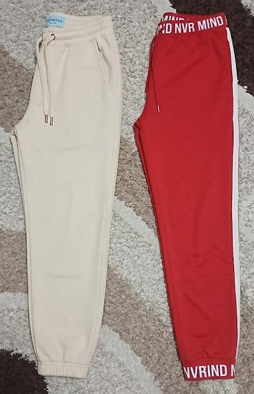 tigraste pantalone: Zenske trenerke 2 kom 1200 — 1