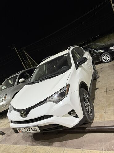 домкраты на авто: Toyota RAV4, белый кроссовер Основные особенности: - Кузов: 5‑дверный