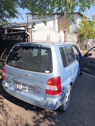 chek it: Mazda Demio: 2001 г., Автомат, Бензин, Хэтчбэк — 6