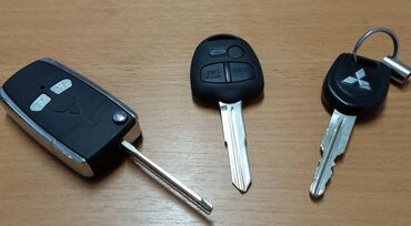 Ключи: Чип ключ Митсубиси 
Изготовление ключей Митсубиси