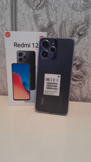 təcili telefon satilir: Xiaomi Redmi 12, 128 GB, rəng - Qara, 
 İki sim kartlı, Sənədlərlə