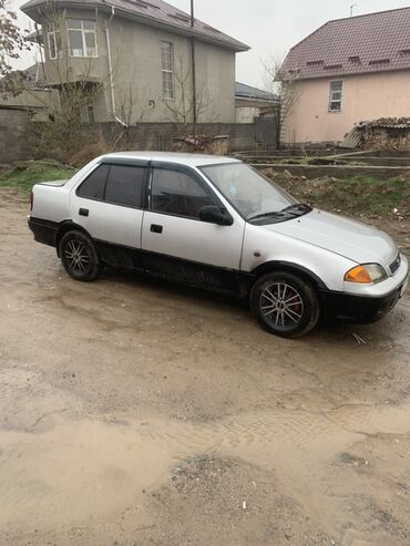 продаю авто: Suzuki Swift: 2003 г., 1 л, Автомат, Бензин, Седан