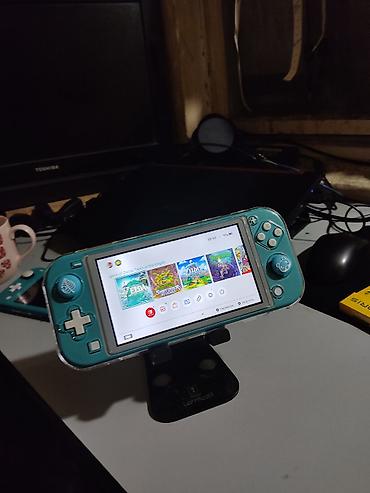 Видеоигры и приставки: Nintendo switch lite чипованный(прошитый) внутренняя память 33гб+64гб — 5