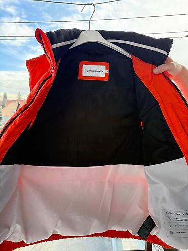 crivit helanke: Prodajem original Calvin Klein muški prsluk, narandžaste boje — 4