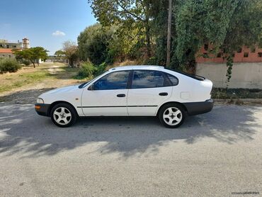 Toyota: Toyota Corolla: 1.3 l. | 1995 έ. Sedan — 5