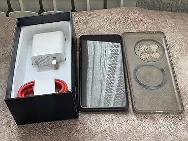 OnePlus 13, Б/у, 256 ГБ, цвет - Серый, 1 SIM, 2 SIM, eSIM