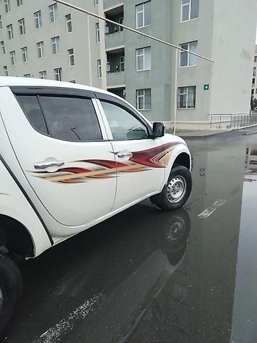 235 55 18: Mitsubishi L200: 2.4 l | 2008 il 302118 km Pikap — 9