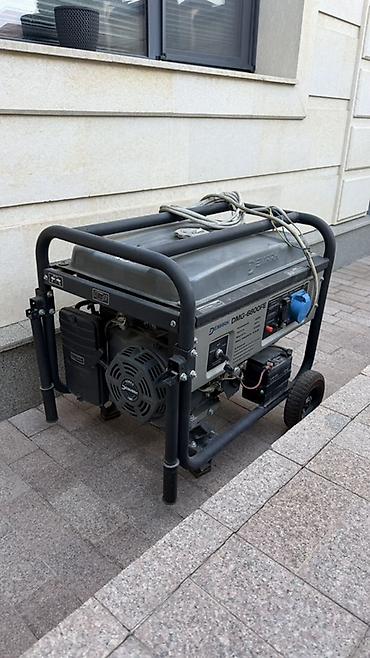 Дом и сад: Бензиновый генератор Dnipro-M DMG-5800FE - Мощность: до 5,8 кВт — 1