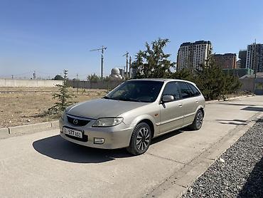 Mazda 323: 2001 г., 1.6 л, Механика, Бензин, Универсал