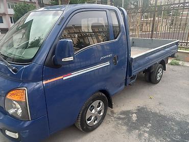 apollo solo: Hyundai Porter II — компактный бортовой грузовик, синий цвет кузова — 3