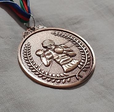 İdman kubokları və medalları: Boks medal dəsti - Rənglər: qızıl, gümüş, bürünc - Dizayn: Hər iki — 12