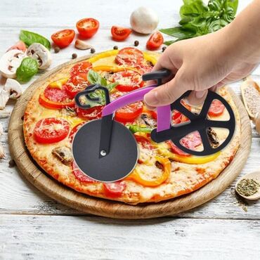 parça kesen: Pizza kesen bıçaq