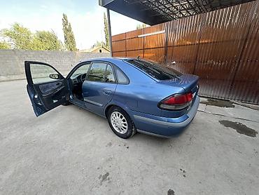 Унаа сатуу: Mazda 626: 1999 г., 2 л, Кол менен иштөөчү, Бензин, Седан — 2