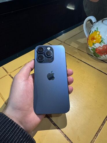 suseli soyuducu: IPhone 15 Pro, Blue Titanium, Barmaq izi, Simsiz şarj, Face ID