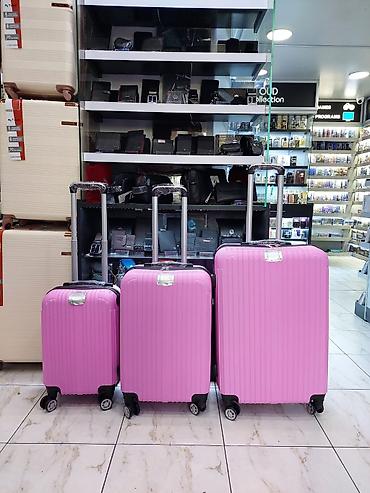Çamadanlar: 3-lü sərnişin çamadan dəsti – çəhrayı Xüsusiyyətlər: - Ölçülər: kiçik — 1