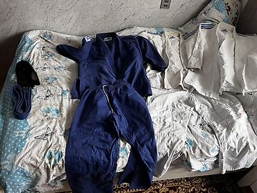 adidas şort: Judo/BJJ geyim dəsti

Dəst qara kəmərlə 30
sadə göy kəmərlə 25 — 1