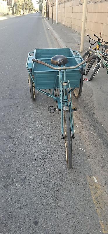 veıosiped: Yükdaşıma üçtəkərli velosiped yaxsi vezziyetdir unvan Merdekan — 4