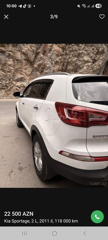 Kia: Kia Sportage: 2 l | 2011 il Krossover — 7