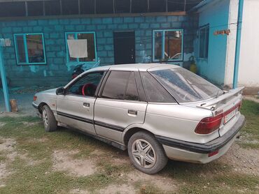 Mitsubishi: Mitsubishi Lancer: 1991 г., 1.3 л, Механика, Бензин, Седан