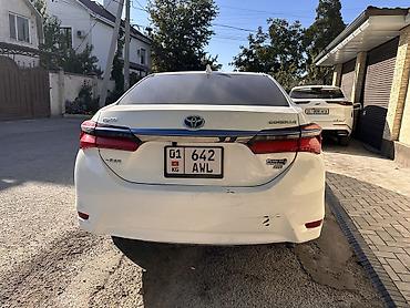 на corolla: Toyota Corolla: 2019 г., 1.8 л, Вариатор, Гибрид, Седан — 10