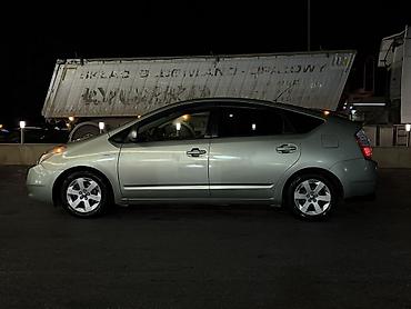 nolyeddi şəkilləri: Toyota Prius (2-ci nəsil) hibrid hetçbek - Gümüş/boz rəngli kuzov, 5 — 3