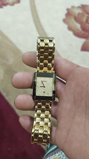 Личные вещи: RADO kişi qol saatı - Korpus: düzbucaqlı forma, qara çərçivəli qızılı — 1