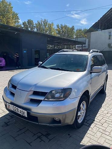 Продажа авто: Mitsubishi Airtrek: 2003 г., 2 л, Механика, Бензин, Кроссовер — 4