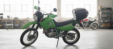 suzuki 200: Мотоцикл Suzuki (эндуро/dual-sport) зелёного цвета. Основные — 1