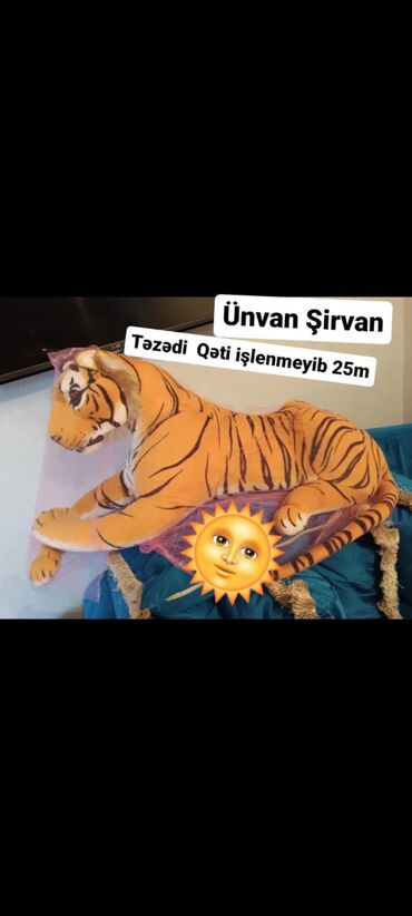 usaq səbəti: Böyük ölçülü, narıncı və qara zolaqlı pələng formalı oyuncaq. Yumşaq