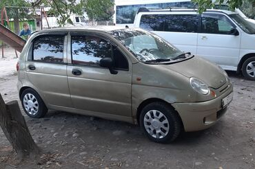 двигатель на matiz: Автомобиль Daewoo Matiz 2006 года выпуска, представленный в бежевом